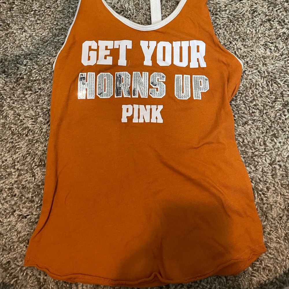 The university of Texas pink shirt
